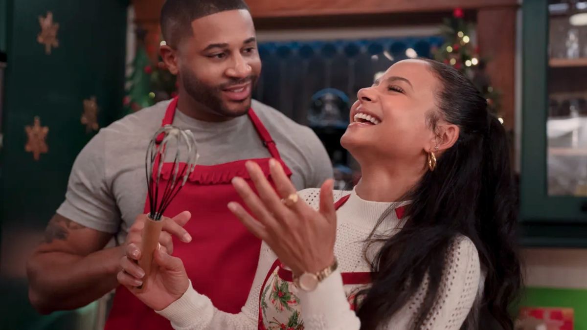 Devale Ellis as Teddy and Christina Milian as Layla in Meet Me Next Christmas