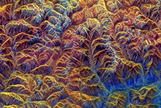 This satellite radar image reveals the rugged nature of the mountains on a southeastern portion of the Tibetan Plateau. Scientists don't agree on what geological mechanisms are at work beneath the plateau, and how they helped form these mountains.