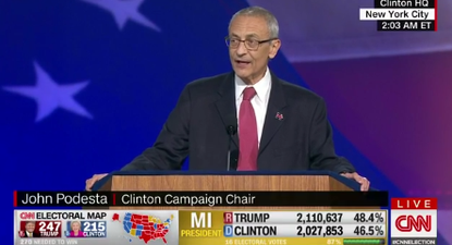 John Podesta speaks to Clinton supporters.