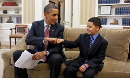 President Obama helps a little man out
