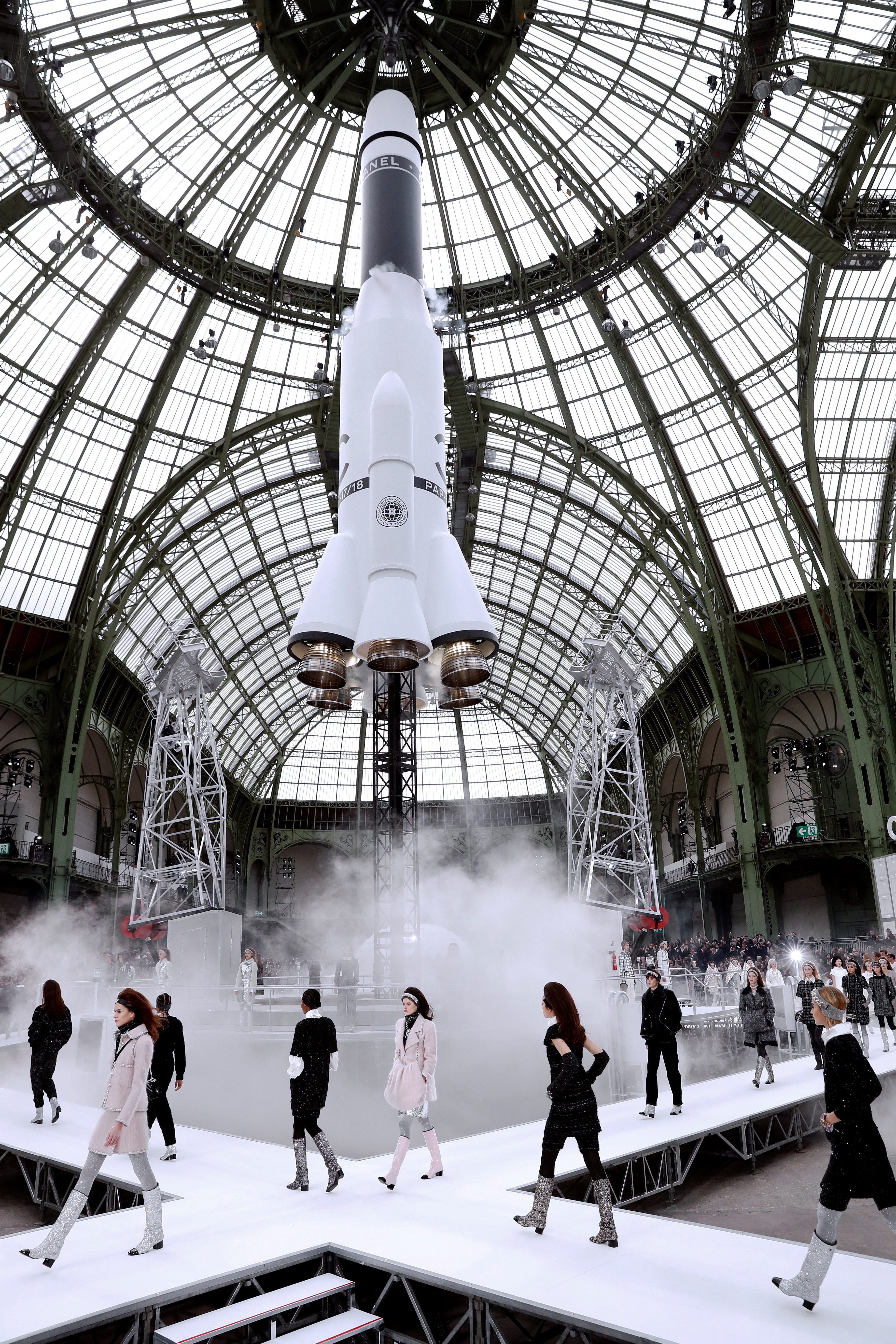 Models present creations by Chanel during the women&#039;s Fall-Winter 2017-2018 ready-to-wear collection fashion show at the Grand Palais in Paris on March 7, 2017. (Photo by Patrick KOVARIK / AFP)