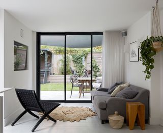 A small living room facing a garden
