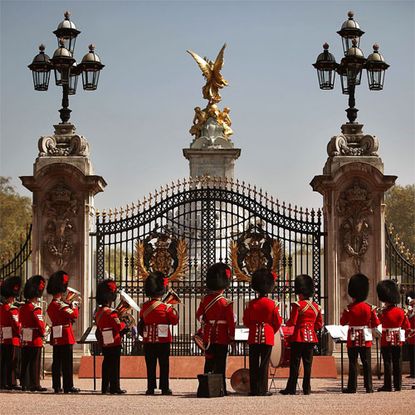 london, england april 20 the band of the coldstream guards form up around the main gate of buckingham palace during the changing of the guard ceremony on april 20, 2011 in london, england soldiers guard queen elizabeth ii and other royals at buckingham palace in a 24 hour rotation with a ceremonial hand over at 1130 in the morning photo by peter macdiarmid wpa pool getty images