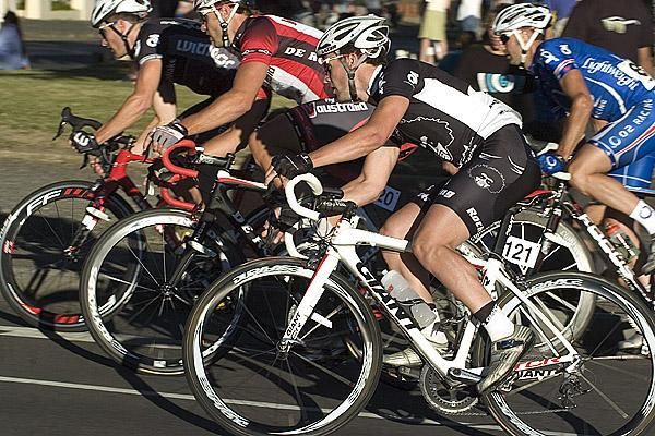 Riders corner at the top of the home straight in Ballarat during the men's open criterium championship.