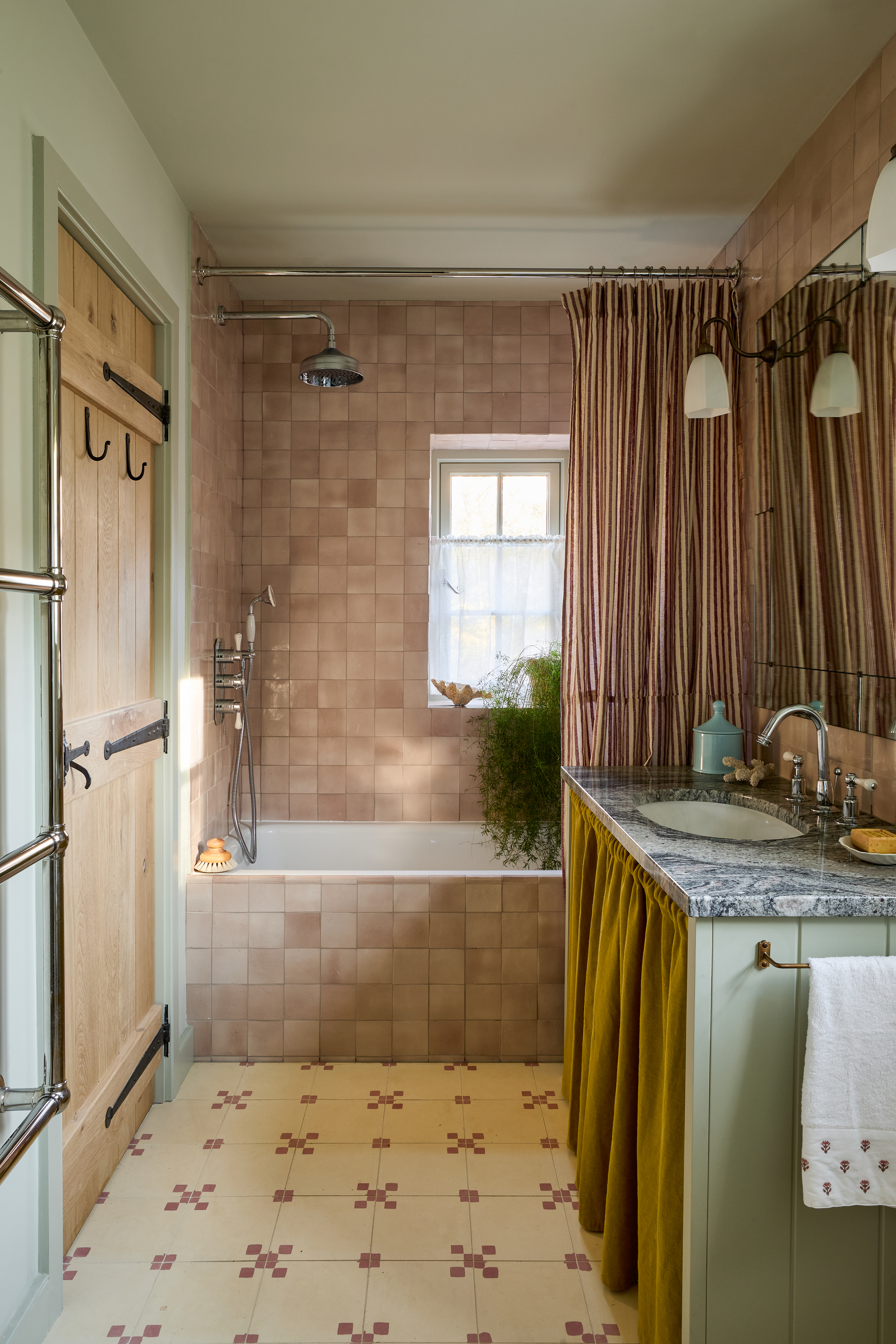 a farmhouse country style peach toned bathroom