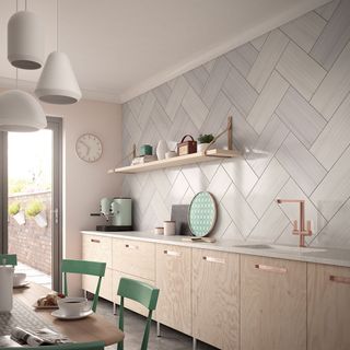 kitchen mosaic tiles wooden flooring wooden cabinet with white marble countertop with wash basin and dinning table with chairs