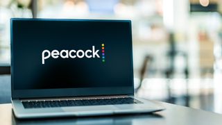 Peacock TV logo on laptop screen
