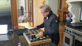 Nvidia CEO pulls out a tray of GPUs in his kitchen