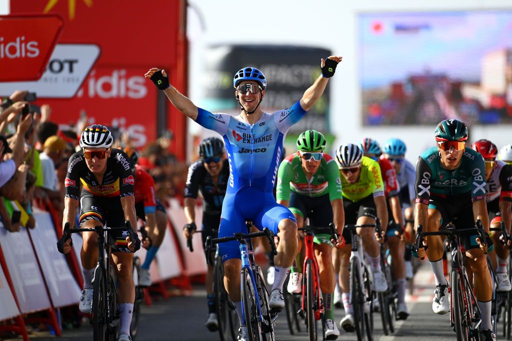 CABO DE GATA SPAIN AUGUST 31 Kaden Groves of Australia and Team BikeExchange Jayco celebrates winning ahead of Danny Van Poppel of Netherlands and Team Bora Hansgrohe and Tim Merlier of Belgium and Team AlpecinDeceuninck during the 77th Tour of Spain 2022 Stage 11 a 1912km stage from ElPozo Alimentacin Alhama de Murcia to Cabo de Gata LaVuelta22 WorldTour on August 31 2022 in Cabo de Gata Spain Photo by Tim de WaeleGetty Images