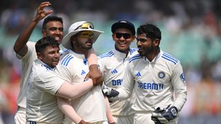 Indian cricketers celebrate England wickets