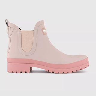 A cutout of pink Barbour welly boots against a light background