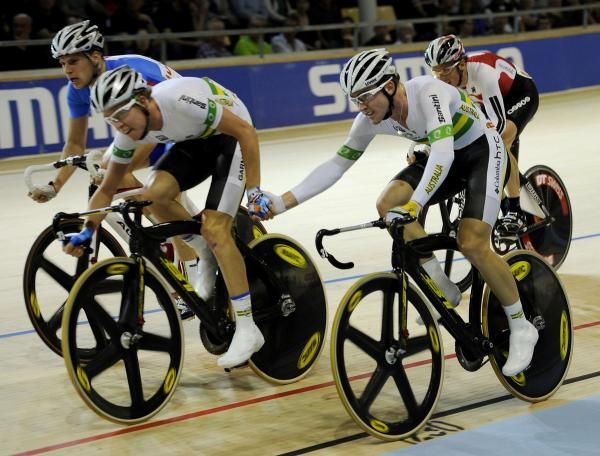 Australia's Cameron Meyer gets a sling from Leigh Howard on his way to a third gold medal at this year's championships.