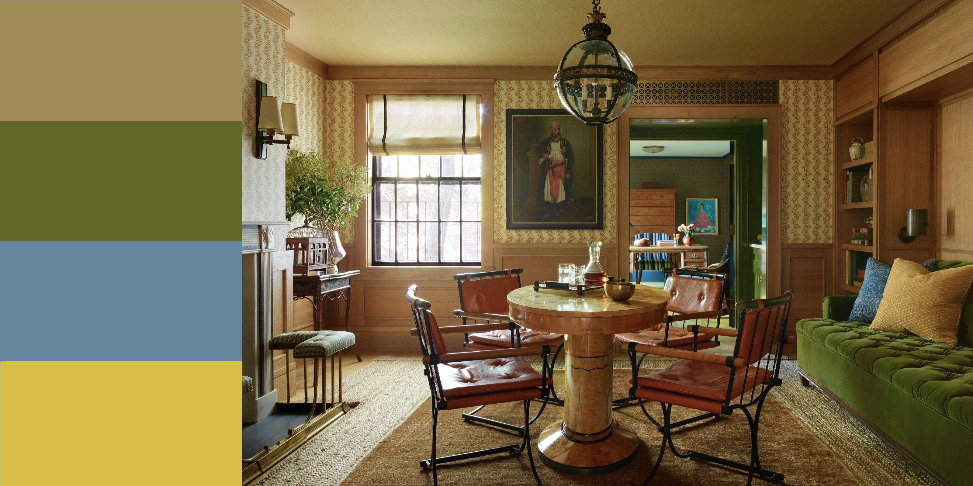 a living space with gold tones, complemented by a green sofa. there&#039;s a table in the middle of the room surrounded by chairs