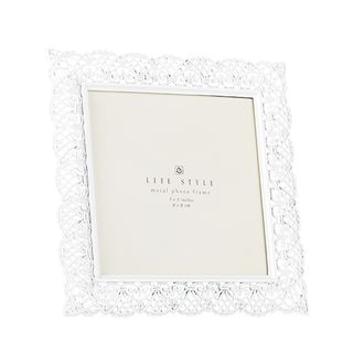 white frame with floral design