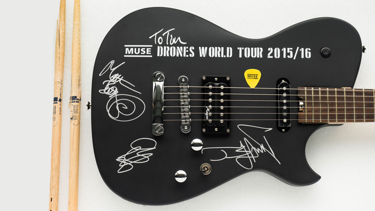 snap Afleiden dwaas Signed Muse Drones Tour Cort/Manson guitar and drum sticks up for auction |  MusicRadar