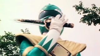 The Green Ranger calling on the power of the Dragonzord in Mighty Morphin Power Rangers