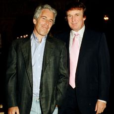 Portrait of American financier Jeffrey Epstein (left) and real estate developer Donald Trump as they pose together at the Mar-a-Lago estate, Palm Beach, Florida on February 22, 1997. (Photo by Davidoff Studios/Getty Images)