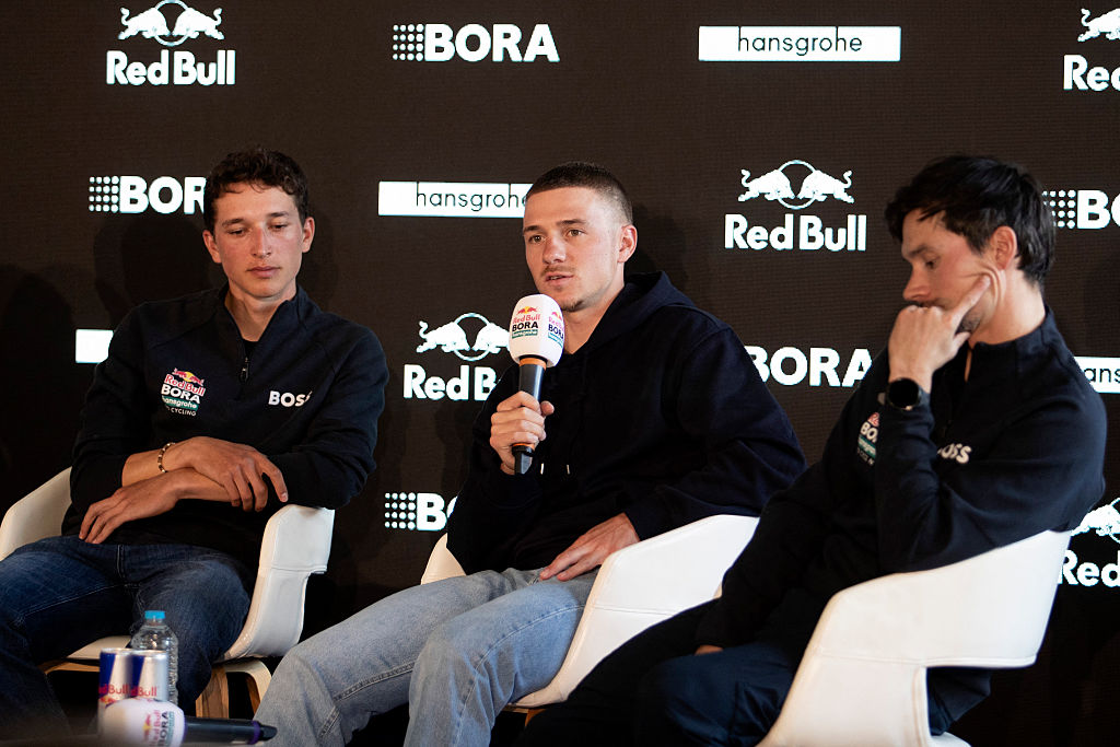 (From L) Red Bull&ndash;Bora&ndash;Hansgrohe&rsquo;s German rider Florian Lipowitz, Belgian rider Remco Evenepoel and Slovenian rider Primoz Roglic attend a press conference in the media day of their new team in Binissalem on Mallorca Island on December 10, 2025. (Photo by Jaime REINA / AFP)