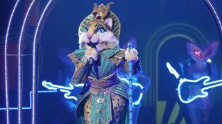 Miss Cleocatra performs on The Masked Singer season 11