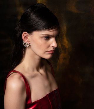 woman wearing Alexis Bittar jewellery