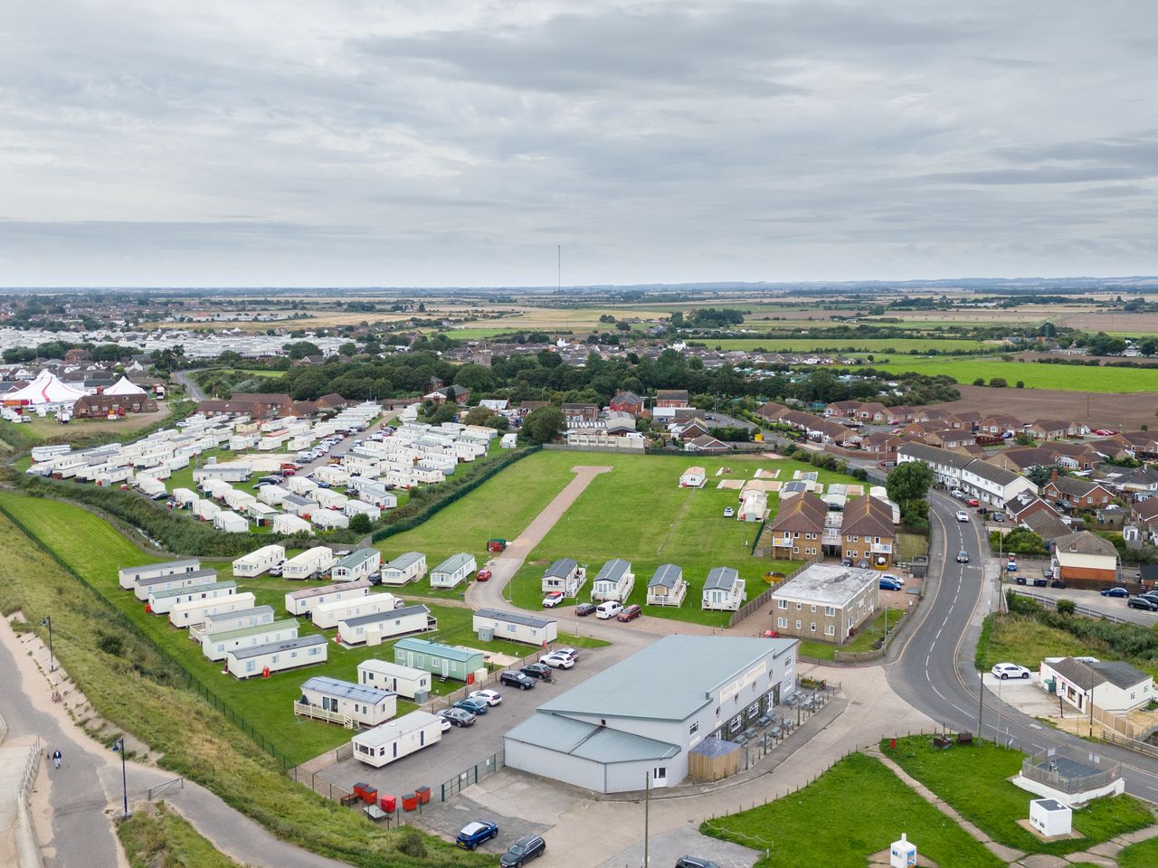 Image taken by DJI Air 3 (a camera drone). Here we see the overhead view of a mobile home park.