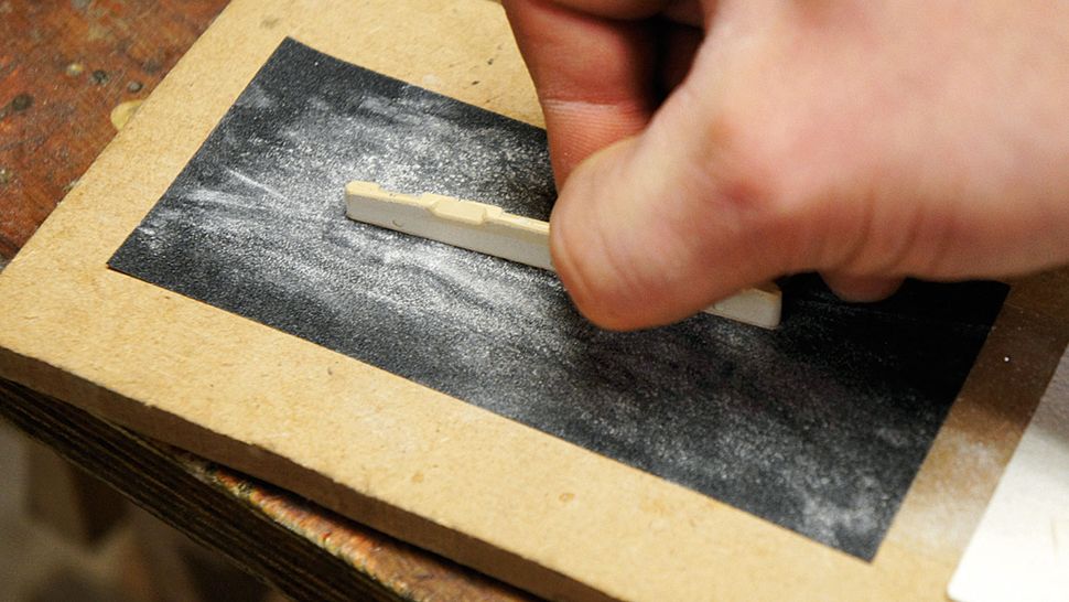 How to set acoustic guitar saddle height MusicRadar