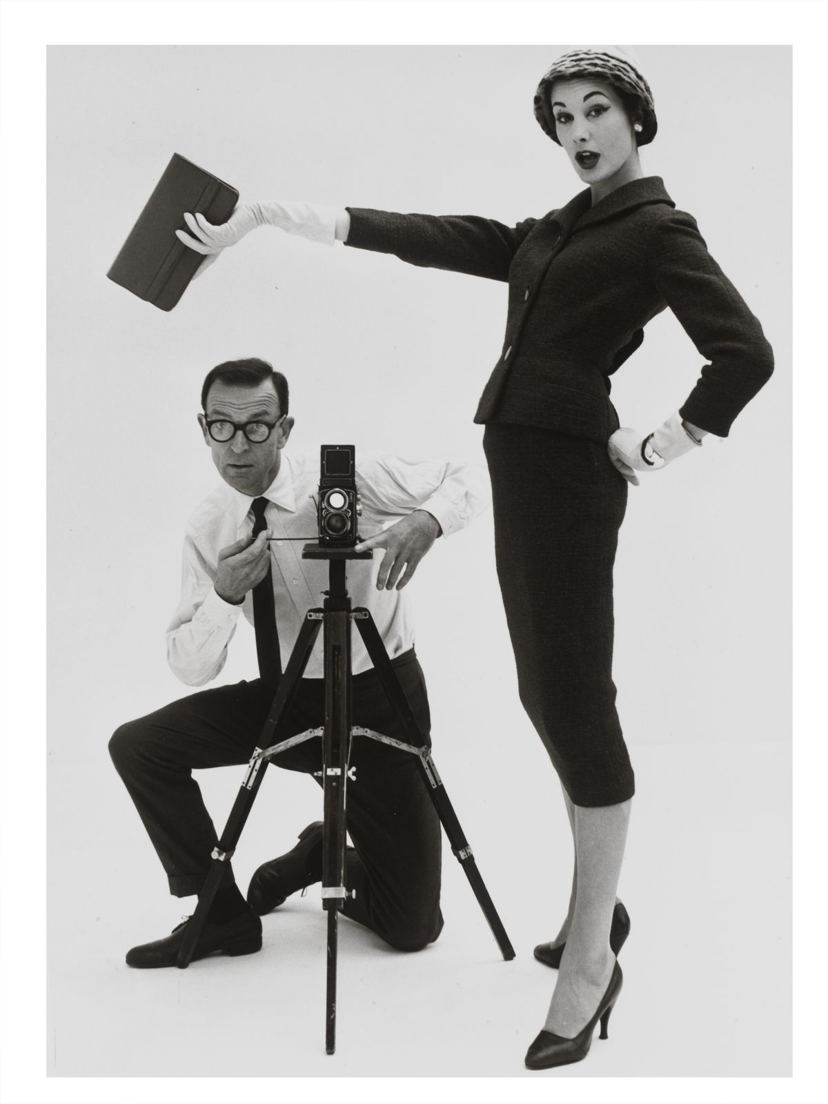 Photographer John French with Daphne Abrams in a tailored suit, published in the TV Times, 1957 &copy; John French Archive
