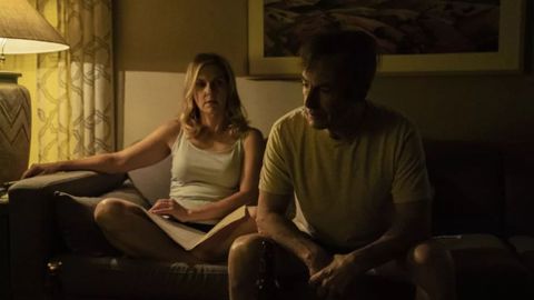 Rhea Seehorn and Bob Odenkirk sit on the couch in Better Call Saul