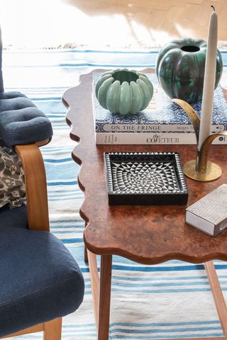 side table with trinkets and books