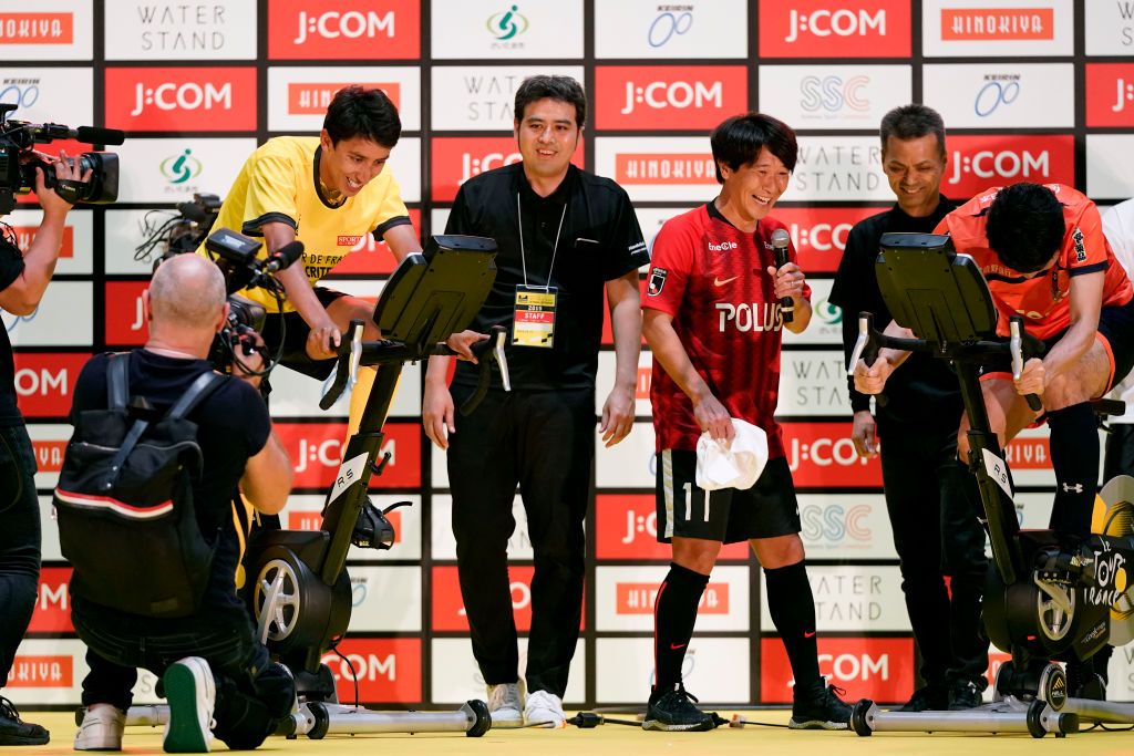 Riders do karate and football-darts before the 2019 Saitama Tour de France criterium