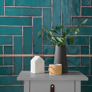 plain pattern tiles wall and white table