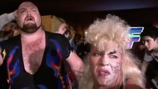 Bam Bam Bigelow and Luna Vachon walking away from ring in WWE
