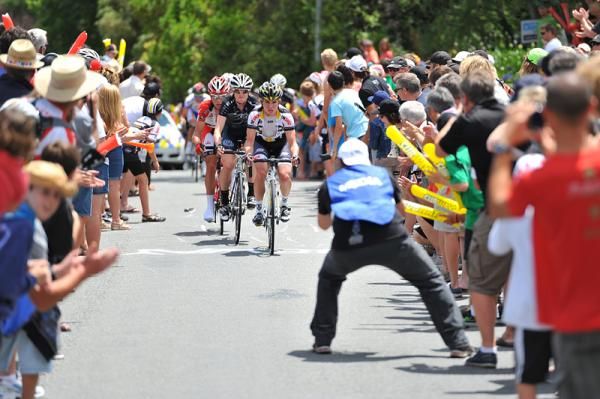 Josh Atkins (Trek Livestrong) threads his way through the crowds.