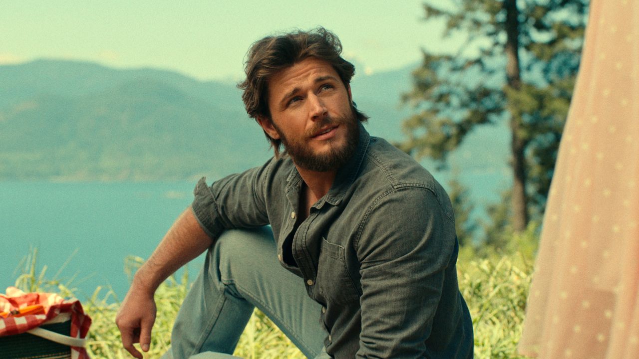 callum kerr as young everett at a picnic on top of a mountain in virgin river season 6