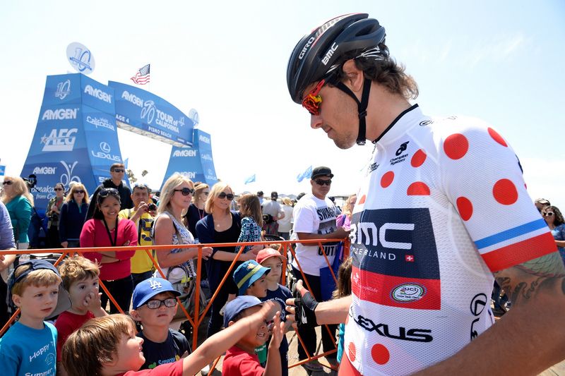 Daniel Oss (BMC) high fives the kids in Pismo Beach