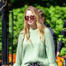 Jennifer Lawrence wearing a green sweater