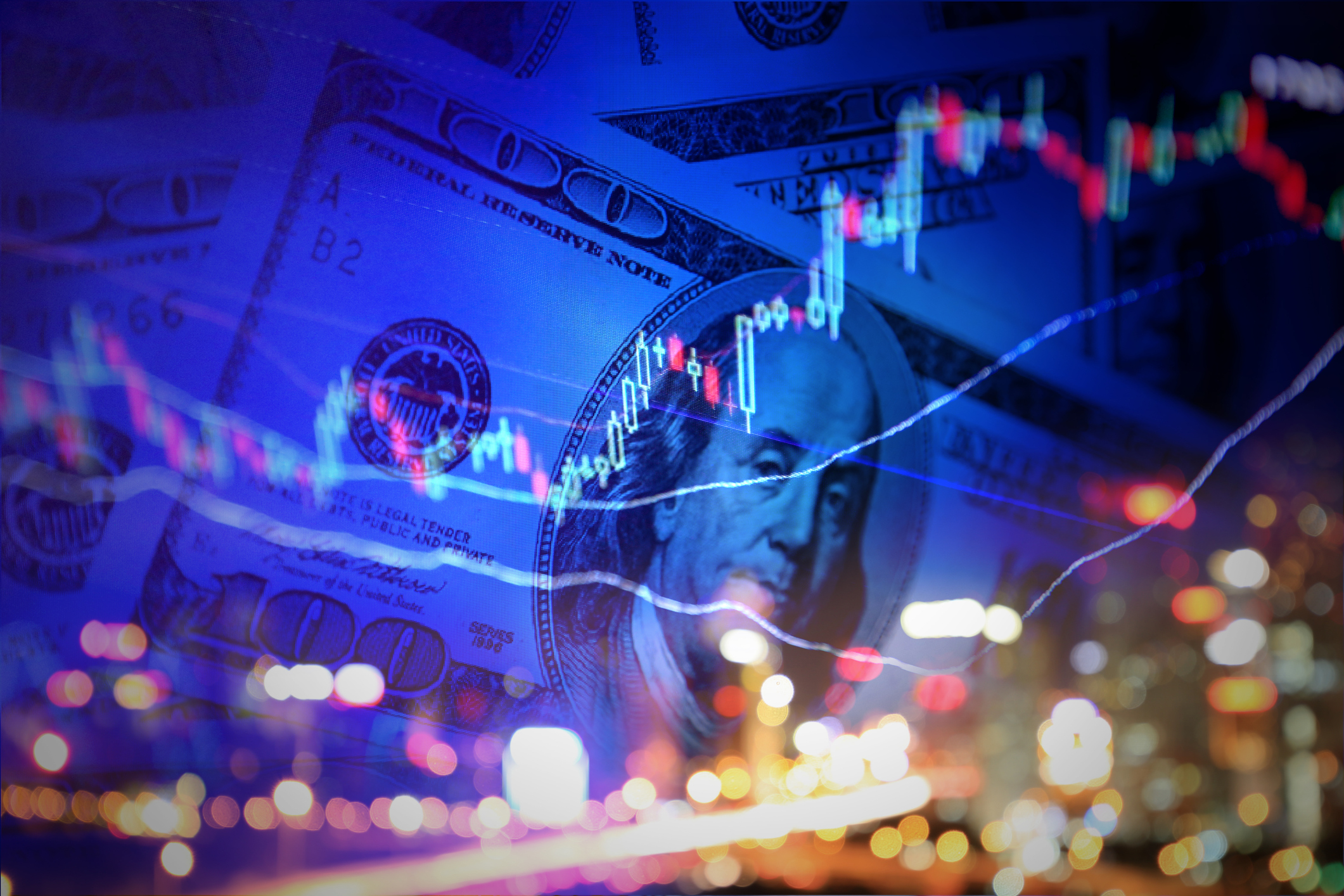 Stock market chart with a USD100 bill and Benjamin Franklin in the background