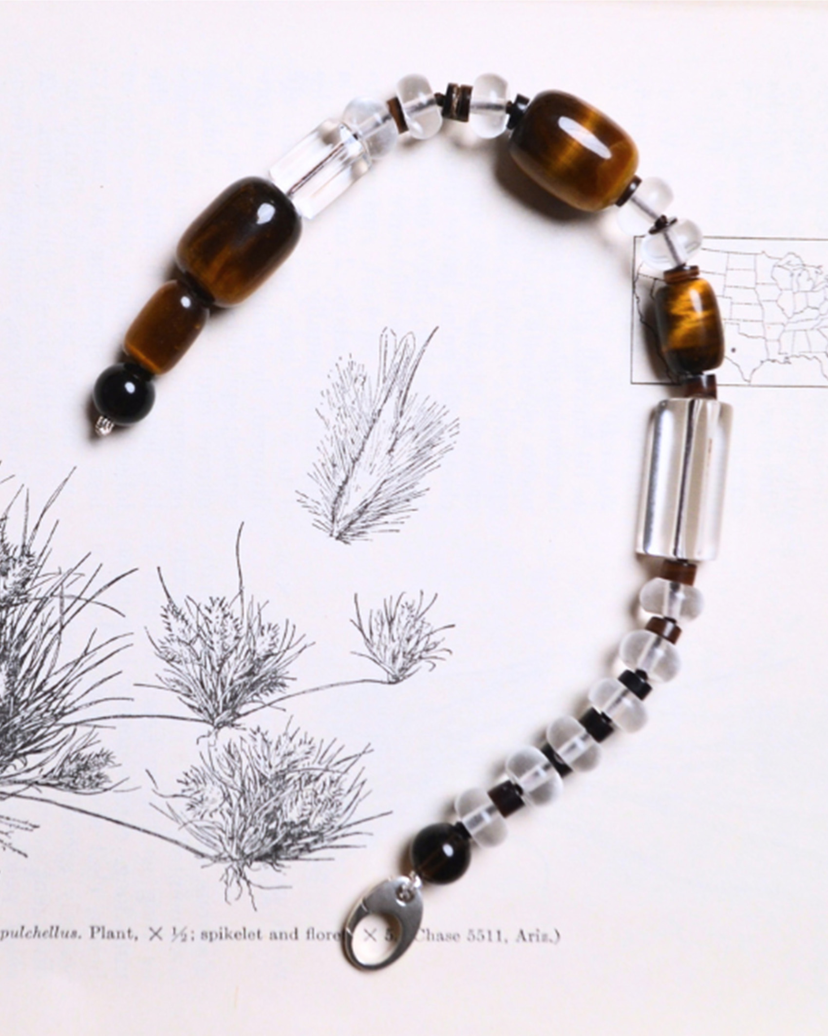 Don't Let Disco necklace on a design background