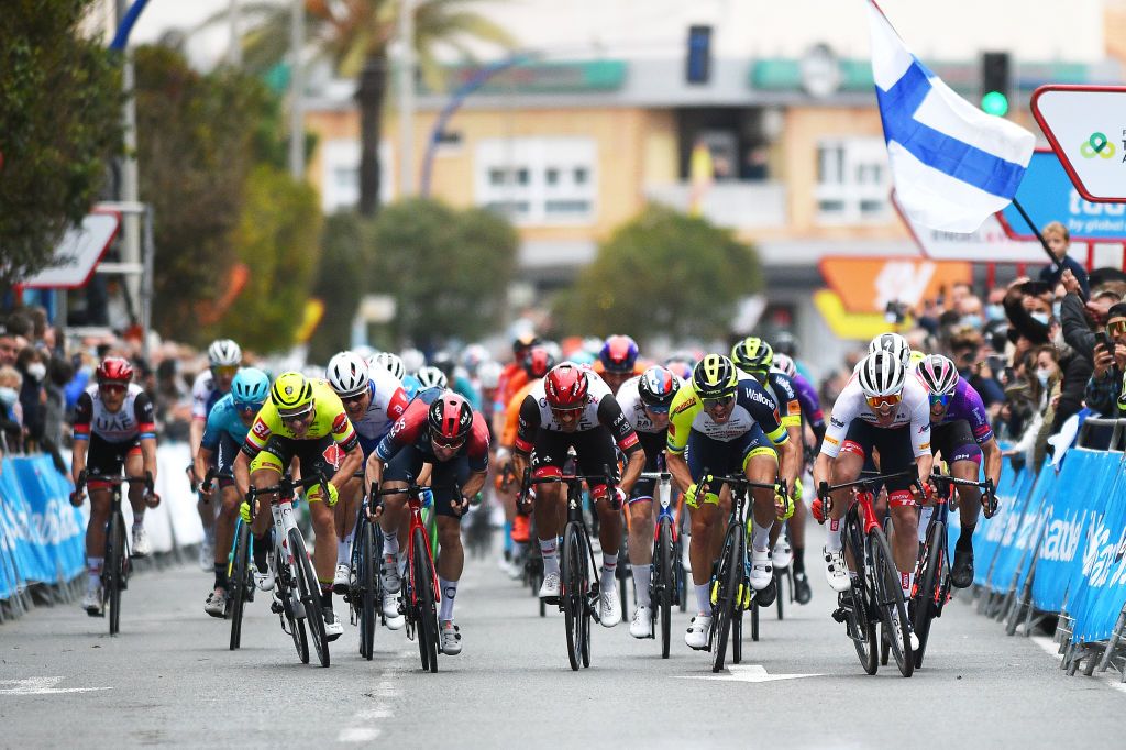 TORREVIEJA SPAIN FEBRUARY 05 LR Stanislaw Aniolkowski of Poland and Team Bingoal Pauwels Sauces WB Elia Viviani of Italy and Team INEOS Grenadiers Lars Van Den Berg of Netherlands and Team Groupama FDJ Juan Sebastin Molano Benavides of Colombia and UAE Team Emirates Alexander Kristoff of Norway and Team Intermarch Wanty Gobert Matriaux Matteo Moschetti of Italy and Team Trek Segafredo and Manuel Penalver Aniorte of Spain and Team Burgos BH sprint during the 73rd Volta A La Comunitat Valenciana 2022 Stage 4 a 1931km stage from Orihuela to Torrevieja VCV2022 on February 05 2022 in Torrevieja Spain Photo by Dario BelingheriGetty Images