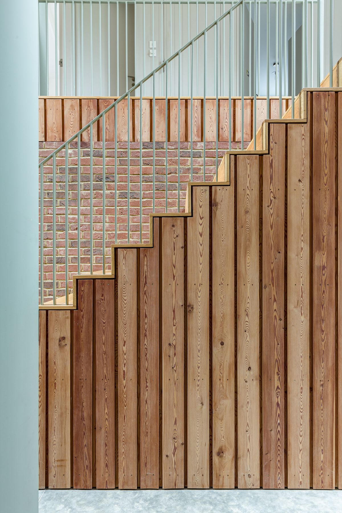 timber clad staircase in self build home