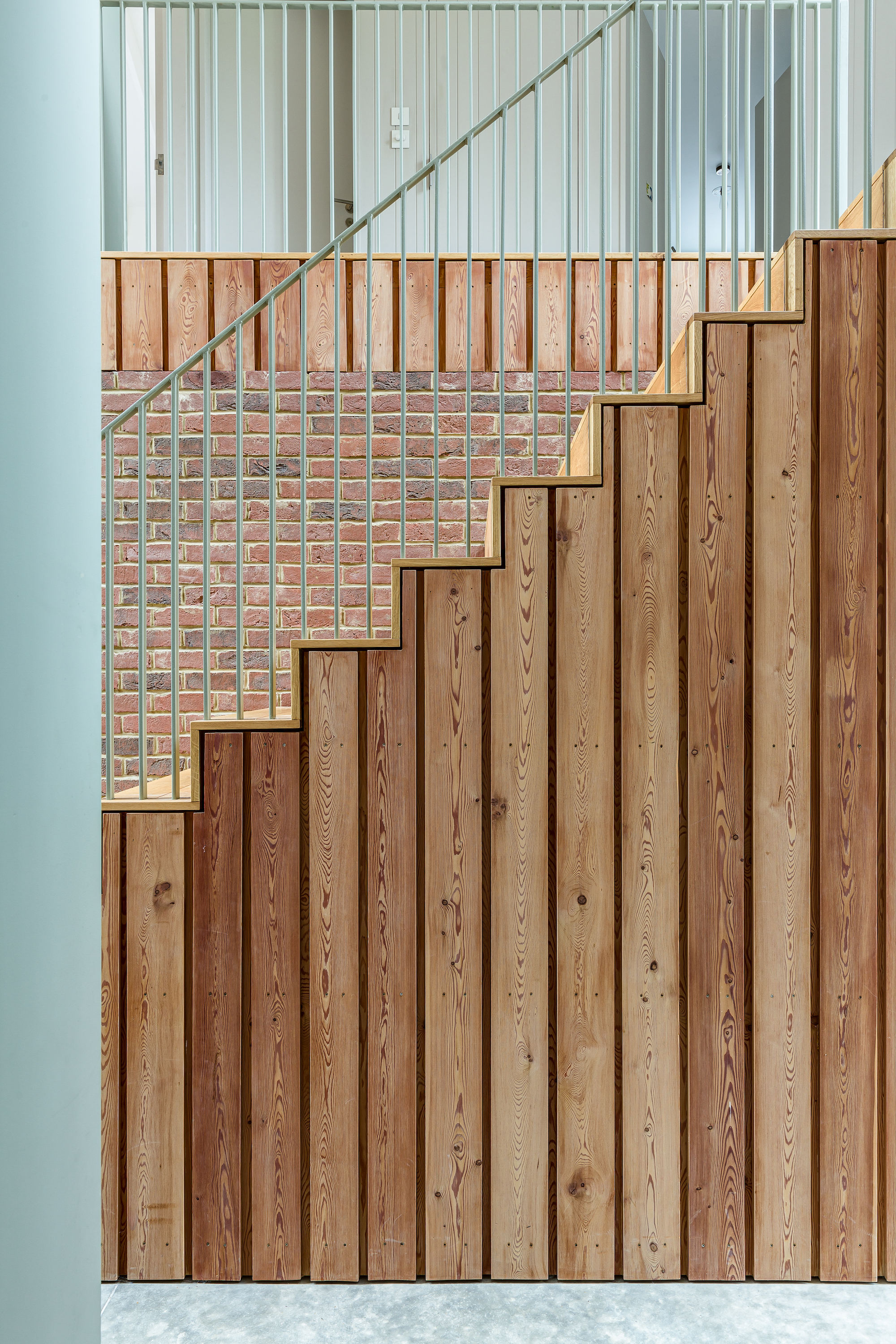 timber clad staircase in self build home