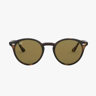 flat lay image of round sunglasses