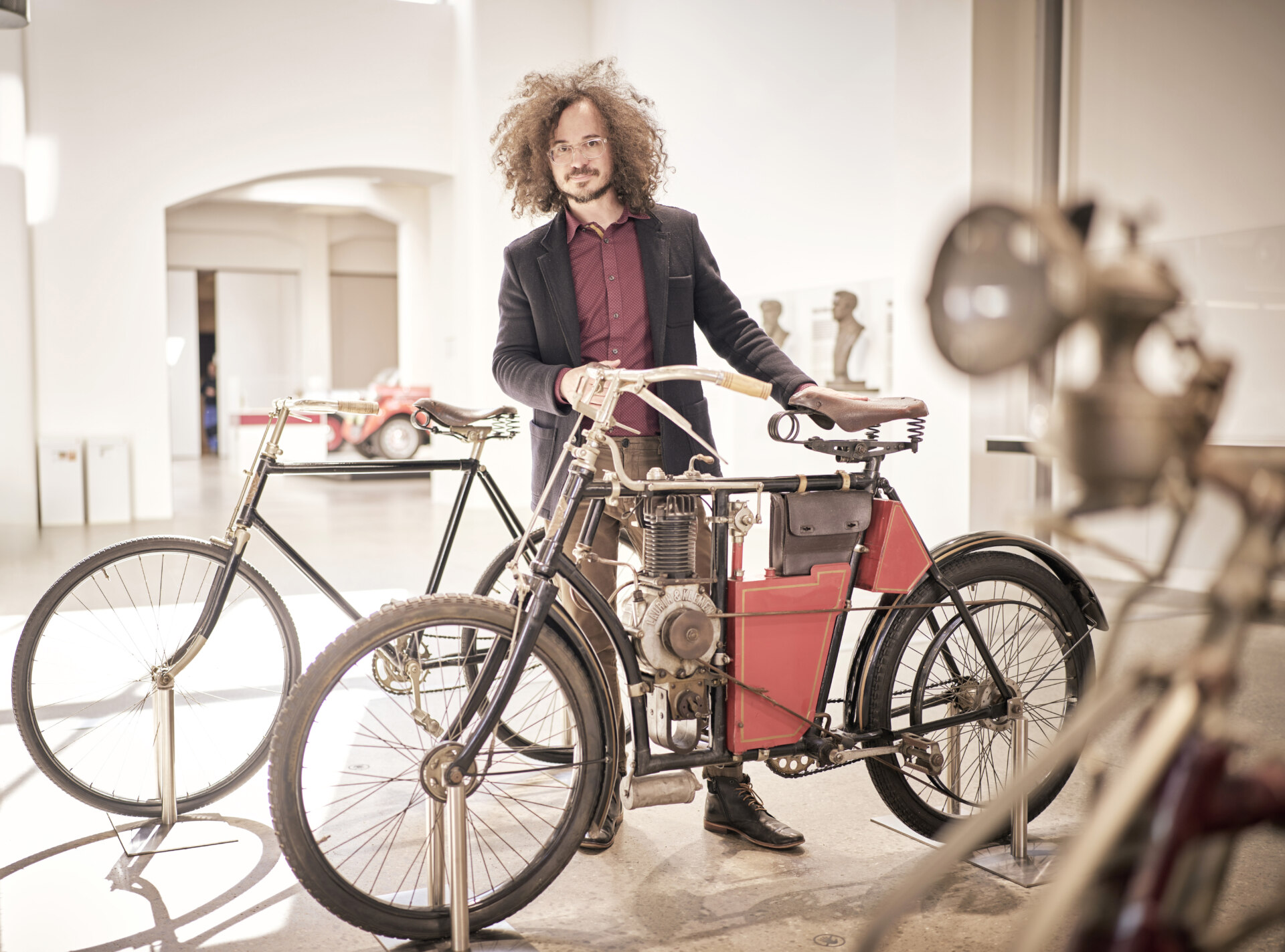 Designer Romain Bucaille with the original 1899 Slavia B motorcycle
