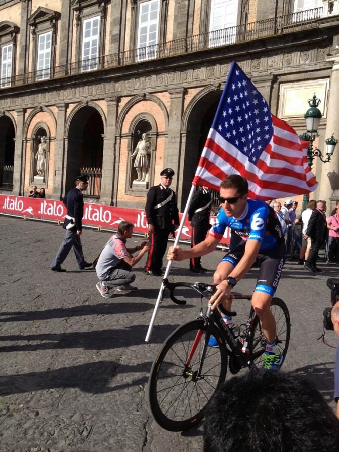 Christian Vande Velde flies the US flag up onto the Giro presentation stage