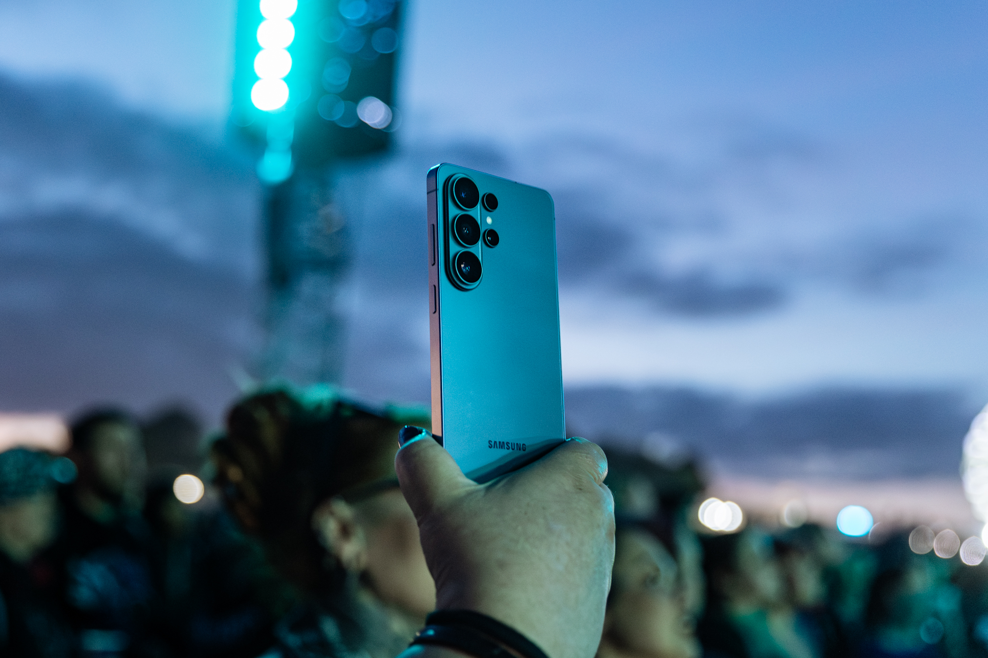 phone held up at concert