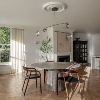 Surrey open-plan living space with ceiling medallion over dining table