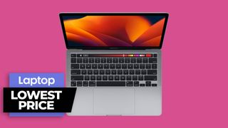M2 MacBook Pro laptop in space gray colorway against pink background