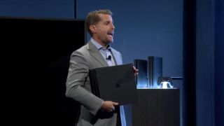 Sony's Andrew House holds a PS4 Pro, as Sony's more iterative strategy takes shape