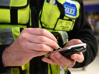 Police with handheld computer