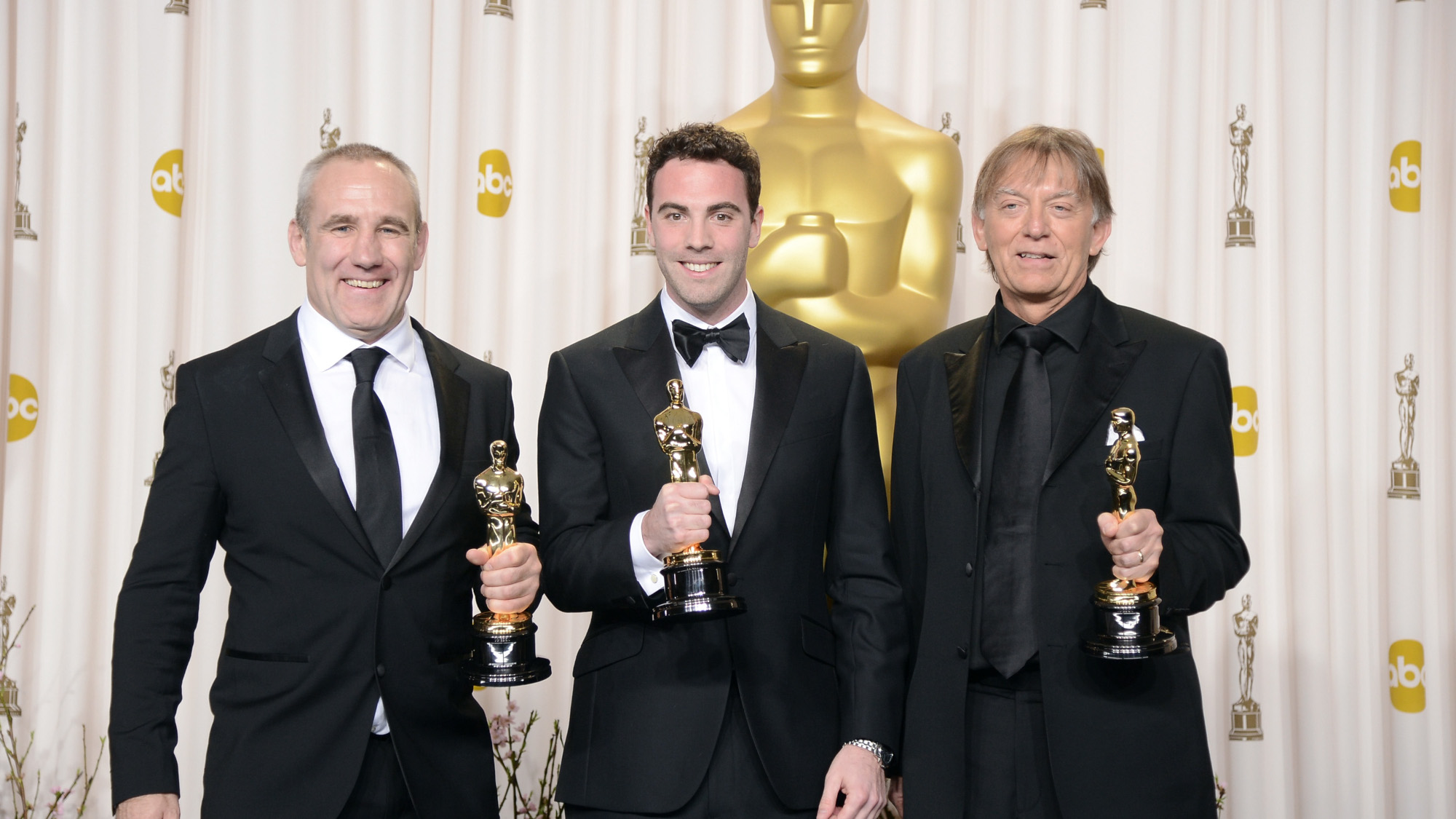 Sound engineers Simon Hayes, Mark Paterson and Andy Nelson, winners of the Best Sound Mixing award for "Les Miserables," during the Oscars on February 24, 2013 in Hollywood, California.